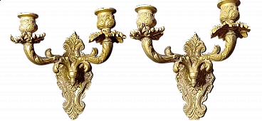 Pair of gilded bronze two-armed wall sconces in Louis XV style, 1920s