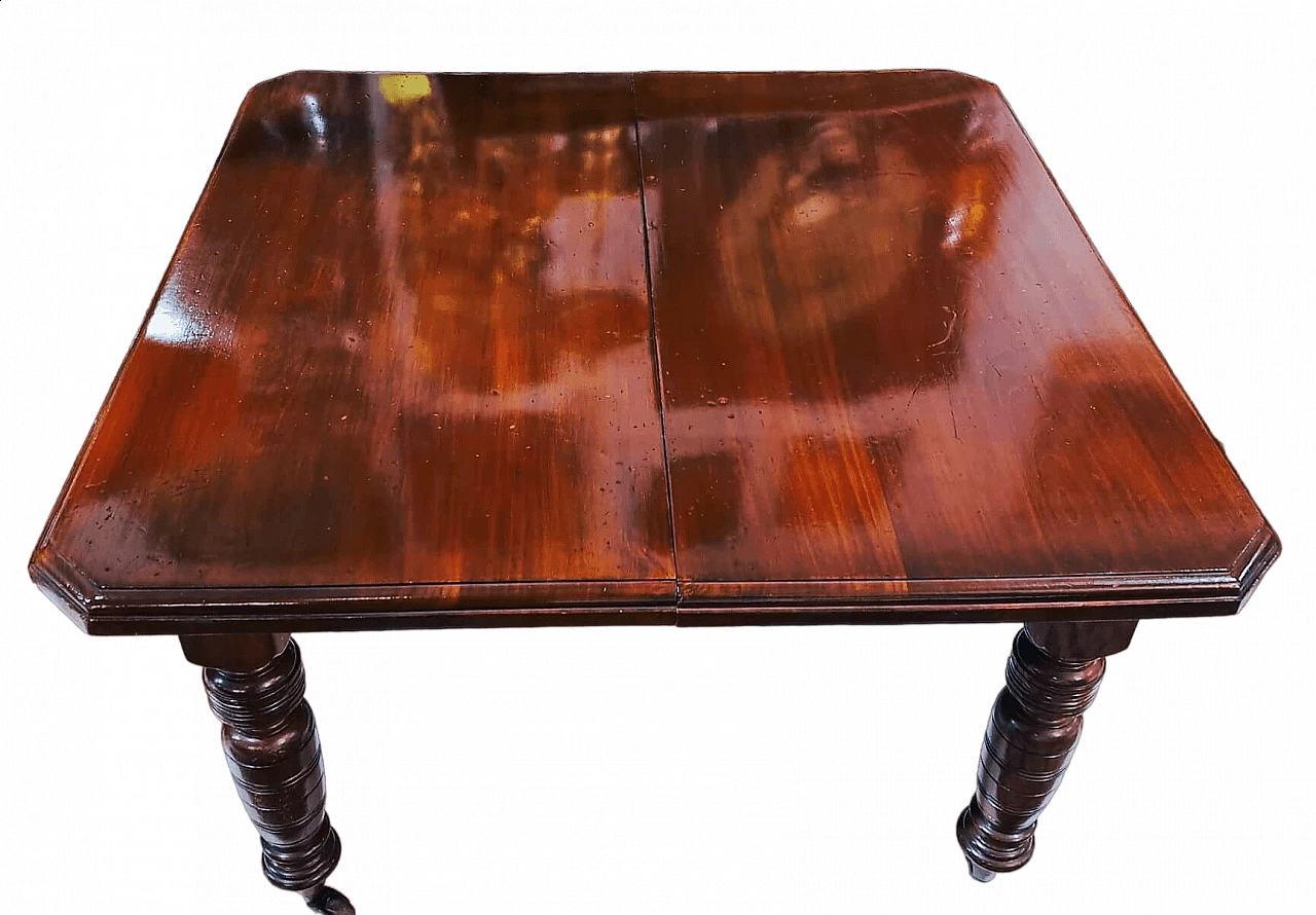 English mahogany extendable table with casters, late 19th century 12