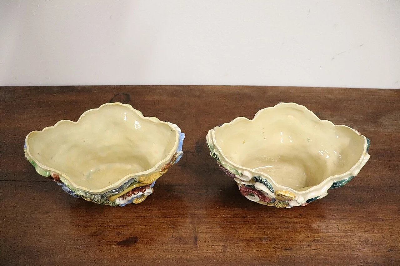 Pair of painted majolica shelves with vase, late 19th century 14