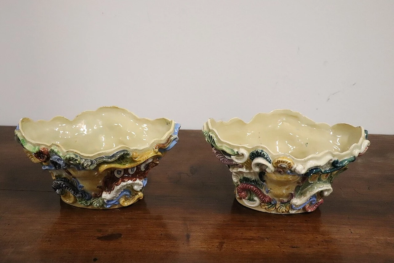 Pair of painted majolica shelves with vase, late 19th century 15