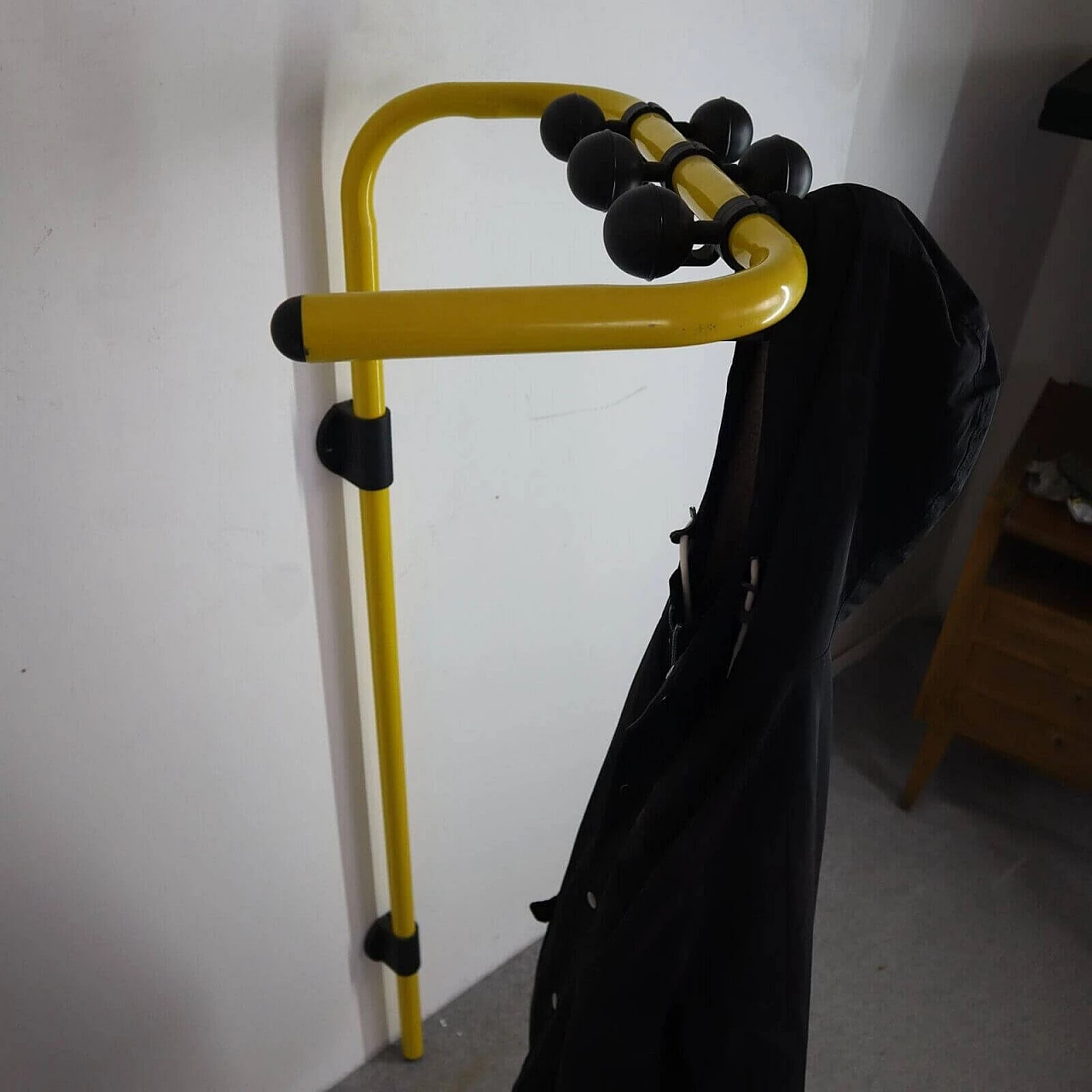 Yellow swivel wall-mounted coat rack by Segis, 1980s 1