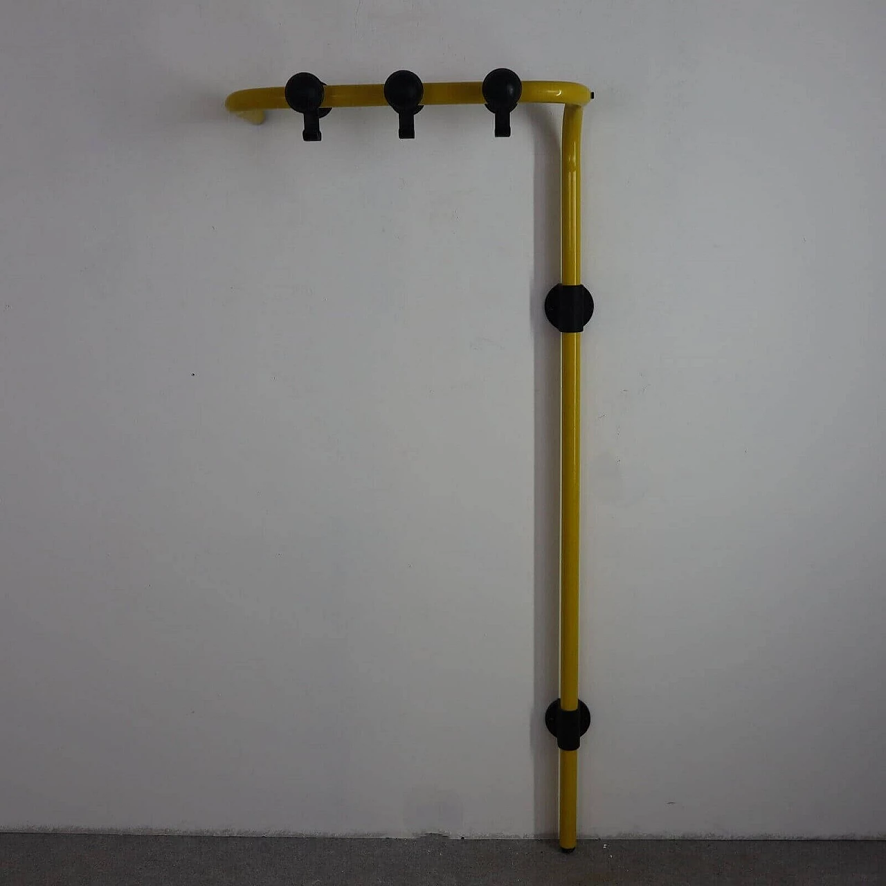 Yellow swivel wall-mounted coat rack by Segis, 1980s 4