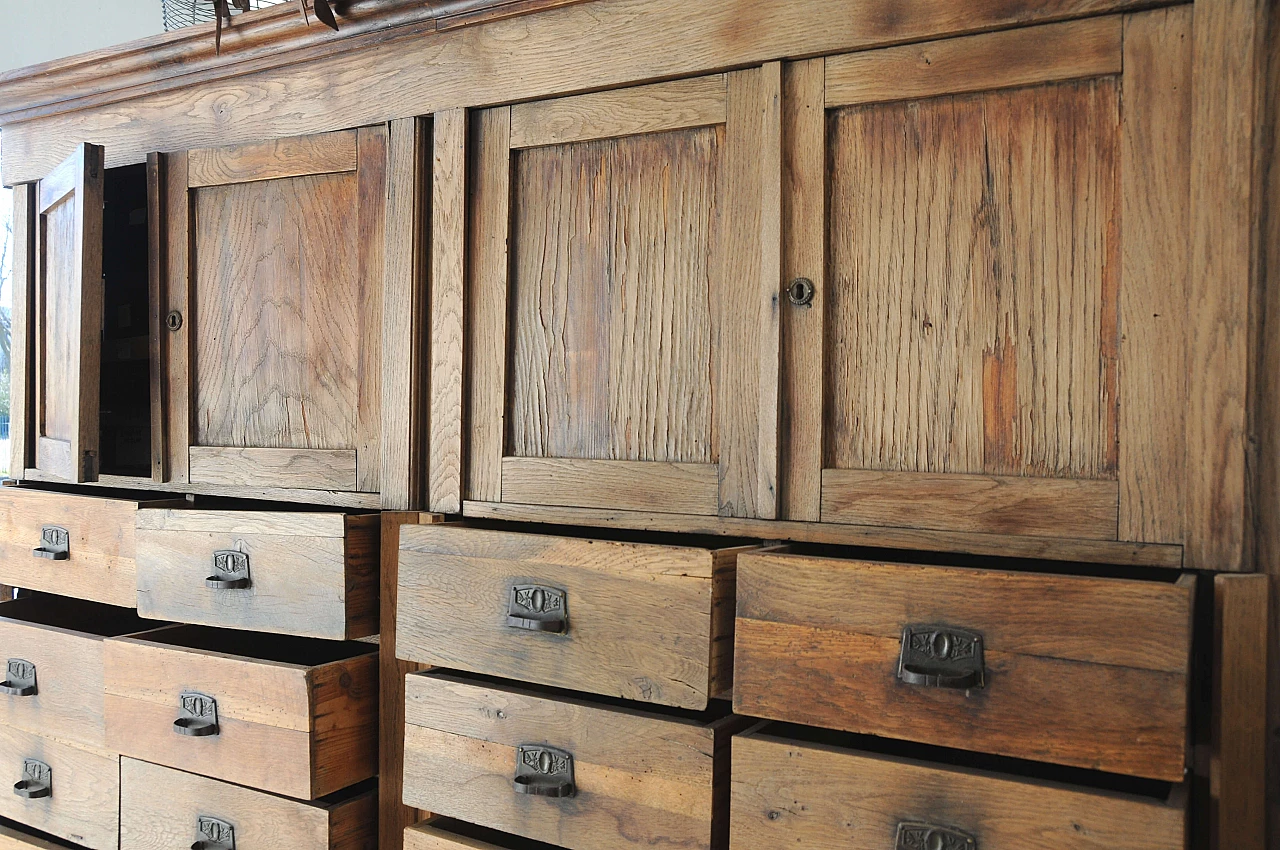 Liberty style oak storage chest of drawers, 1930s 11