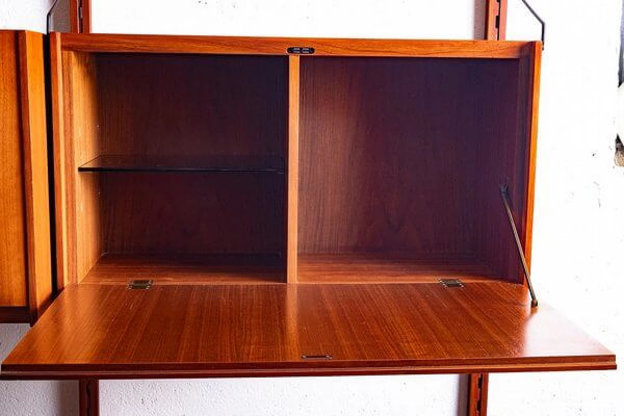 Wall-mounted teak and brass bookcase, 1960s 2