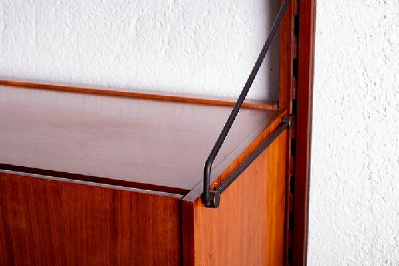 Wall-mounted teak and brass bookcase, 1960s 3