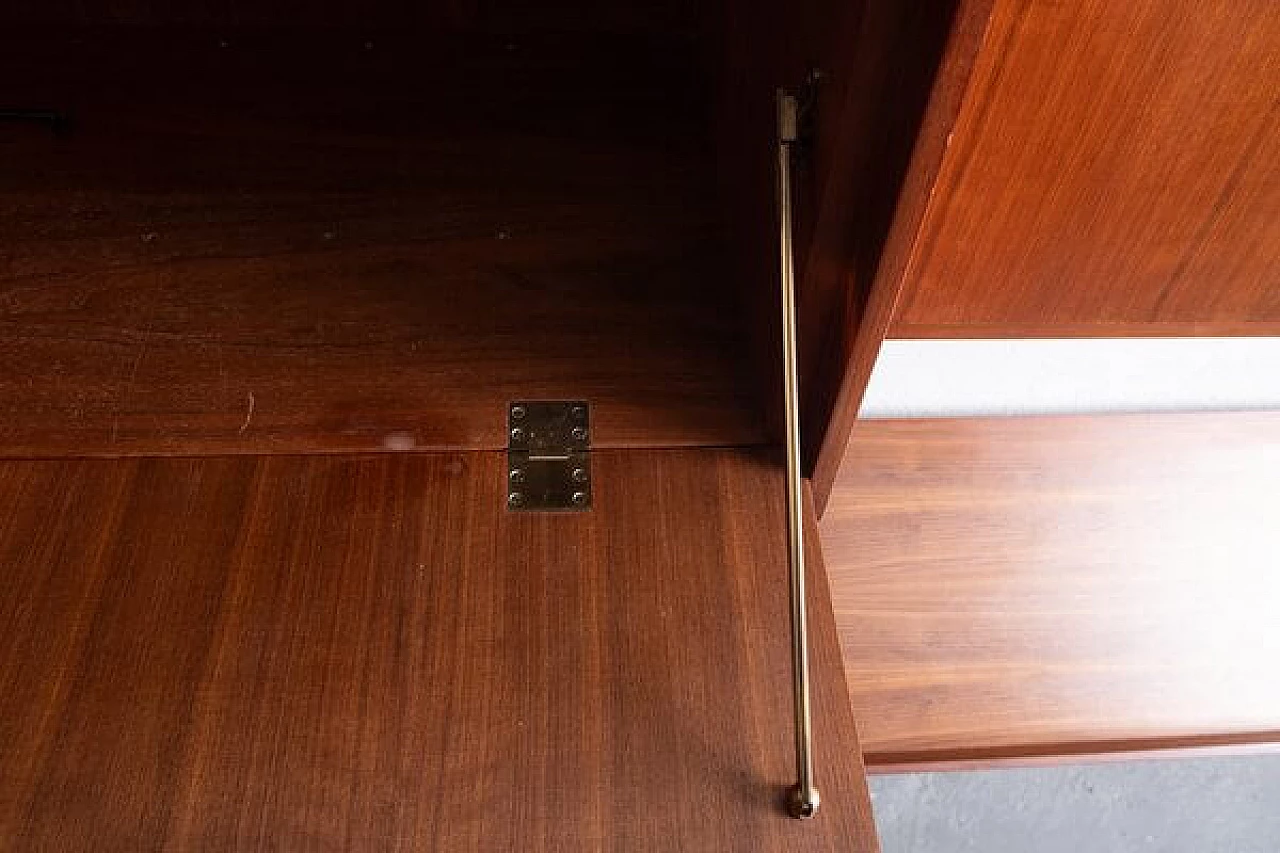 Wall-mounted teak and brass bookcase, 1960s 8