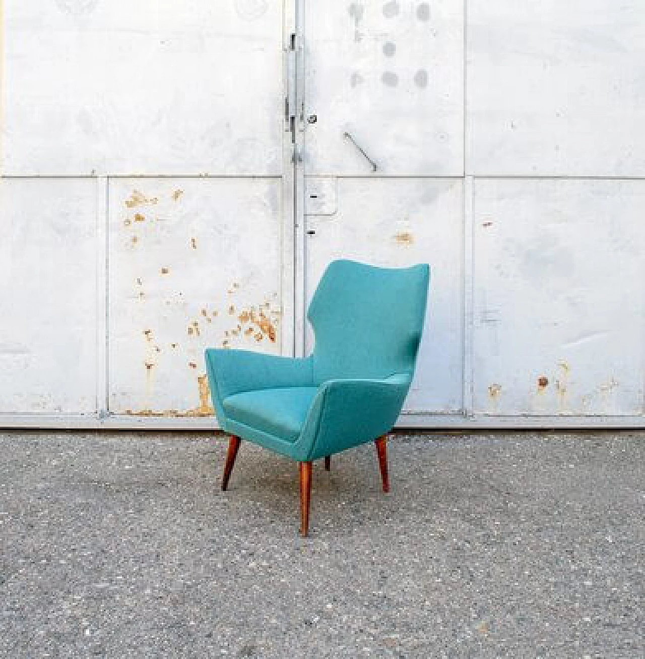 Pair of armchairs with wooden structure and padded seats, 1950s 1