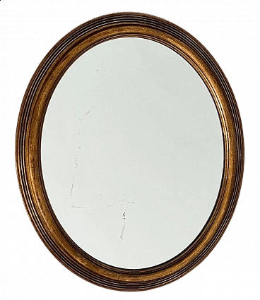 Specchio ovale con cornice in legno intagliato, anni '60