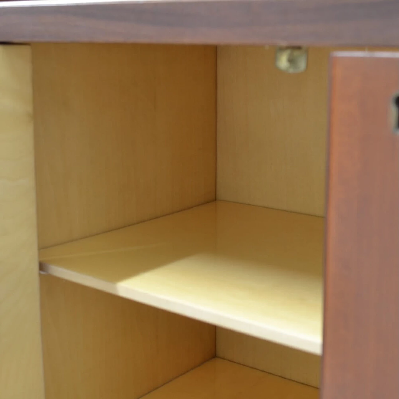 Three-bay wood cabinet with glass sliding doors, 1958 3