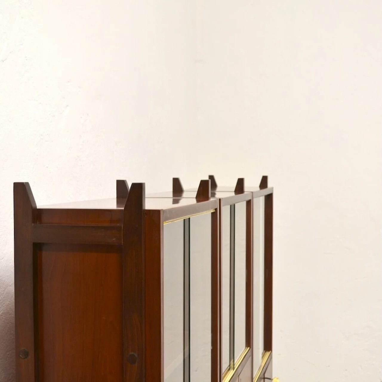 Three-bay wood cabinet with glass sliding doors, 1958 5