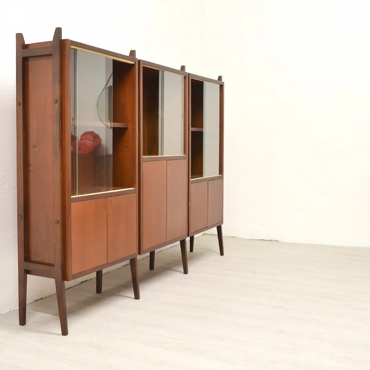 Three-bay wood cabinet with glass sliding doors, 1958 8