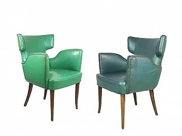 Pair of skai and wood armchairs in the style of Melchiorre Bega, 1950s