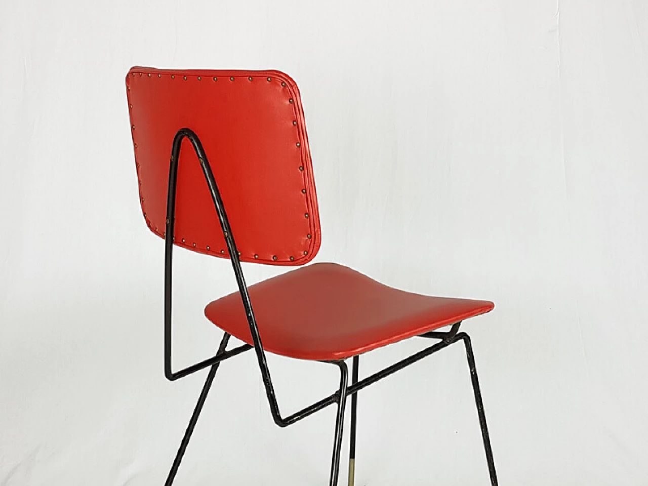 Pair of black metal and red skai chairs, 1950s 7