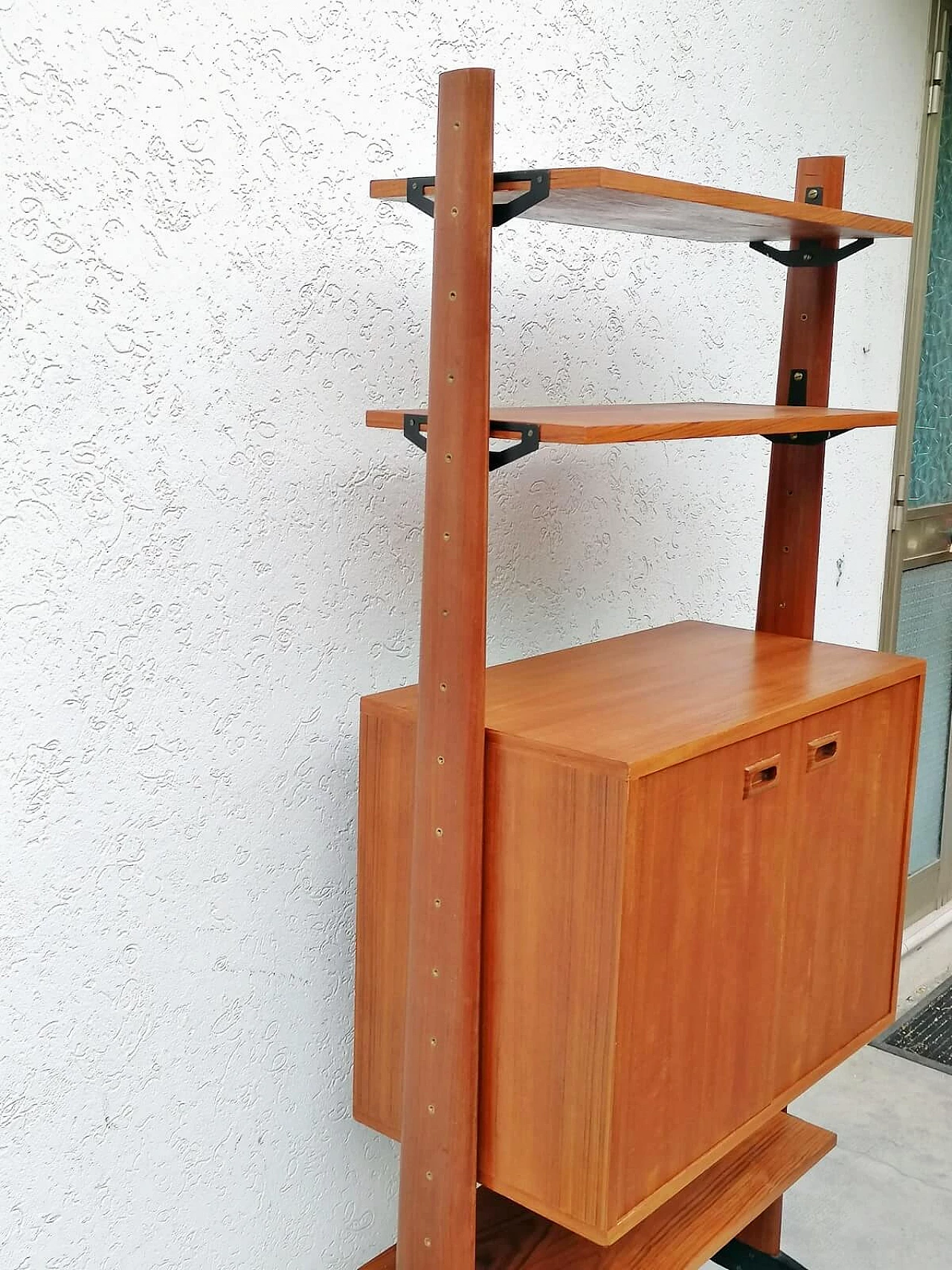 Teak, black varnished metal and brass bookcase, 1960s 5