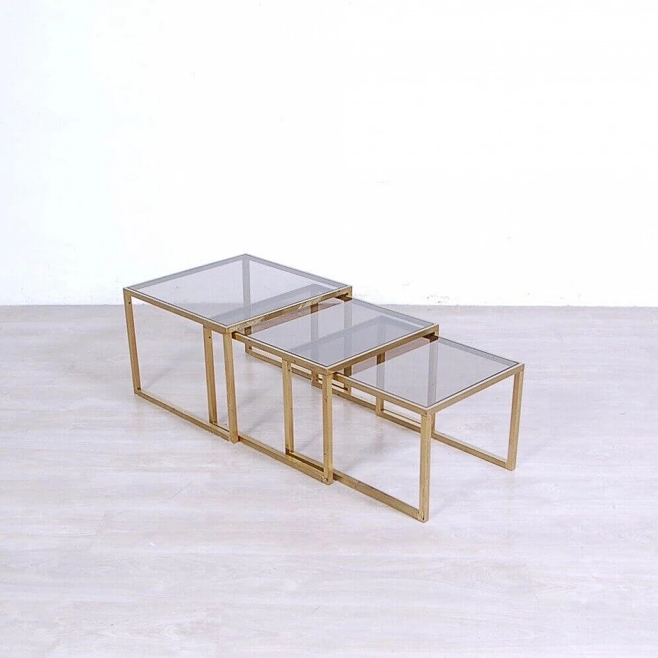 3 Nest coffee tables in brass and smoked glass, 1970s 1