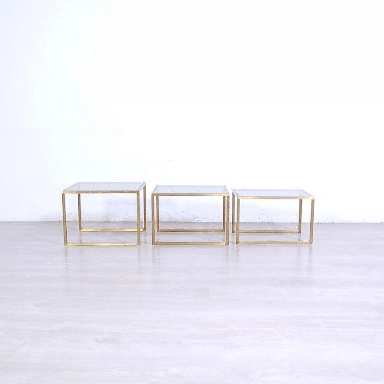 3 Nest coffee tables in brass and smoked glass, 1970s 4