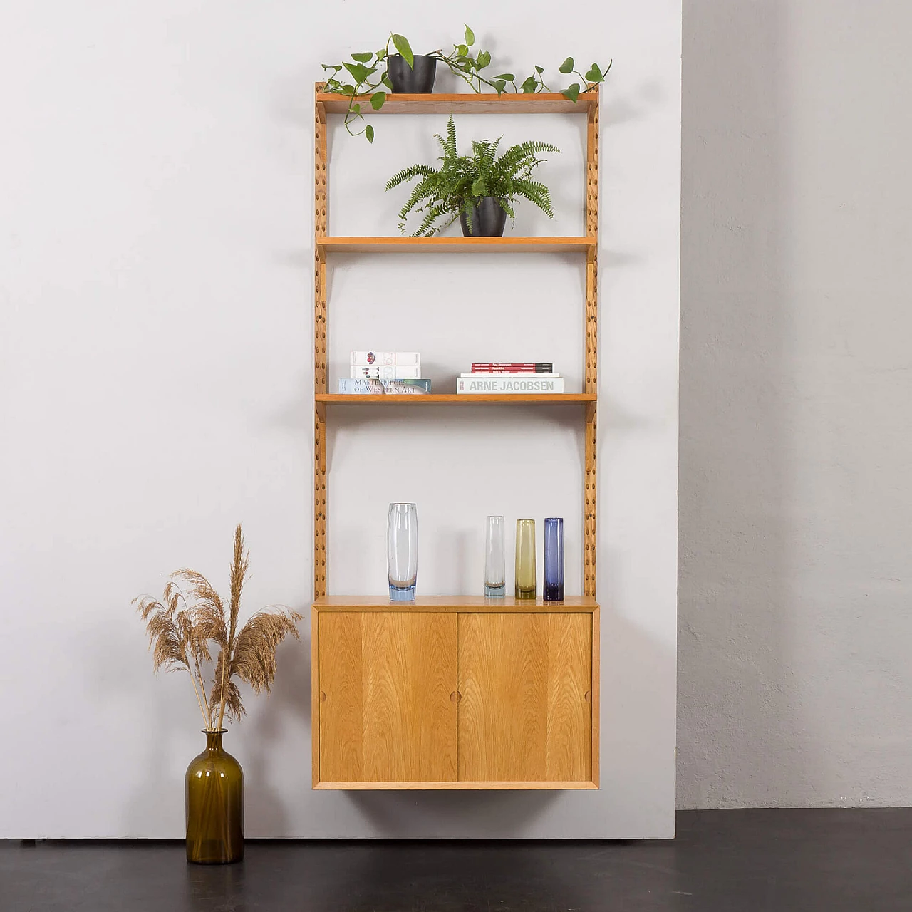 One-bay oak bookcase with sliding door cabinet by Poul Cadovius, 1960s 1