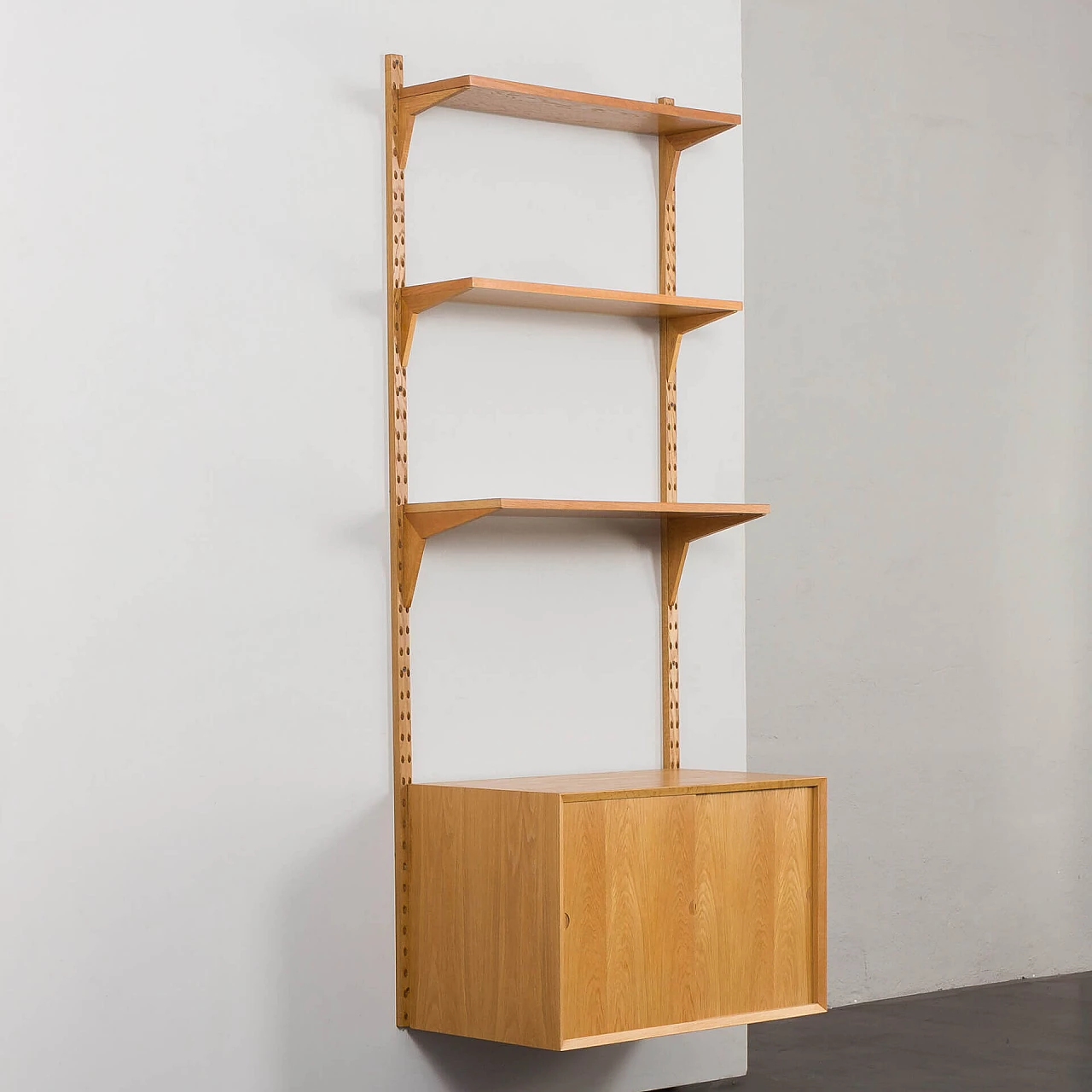 One-bay oak bookcase with sliding door cabinet by Poul Cadovius, 1960s 3