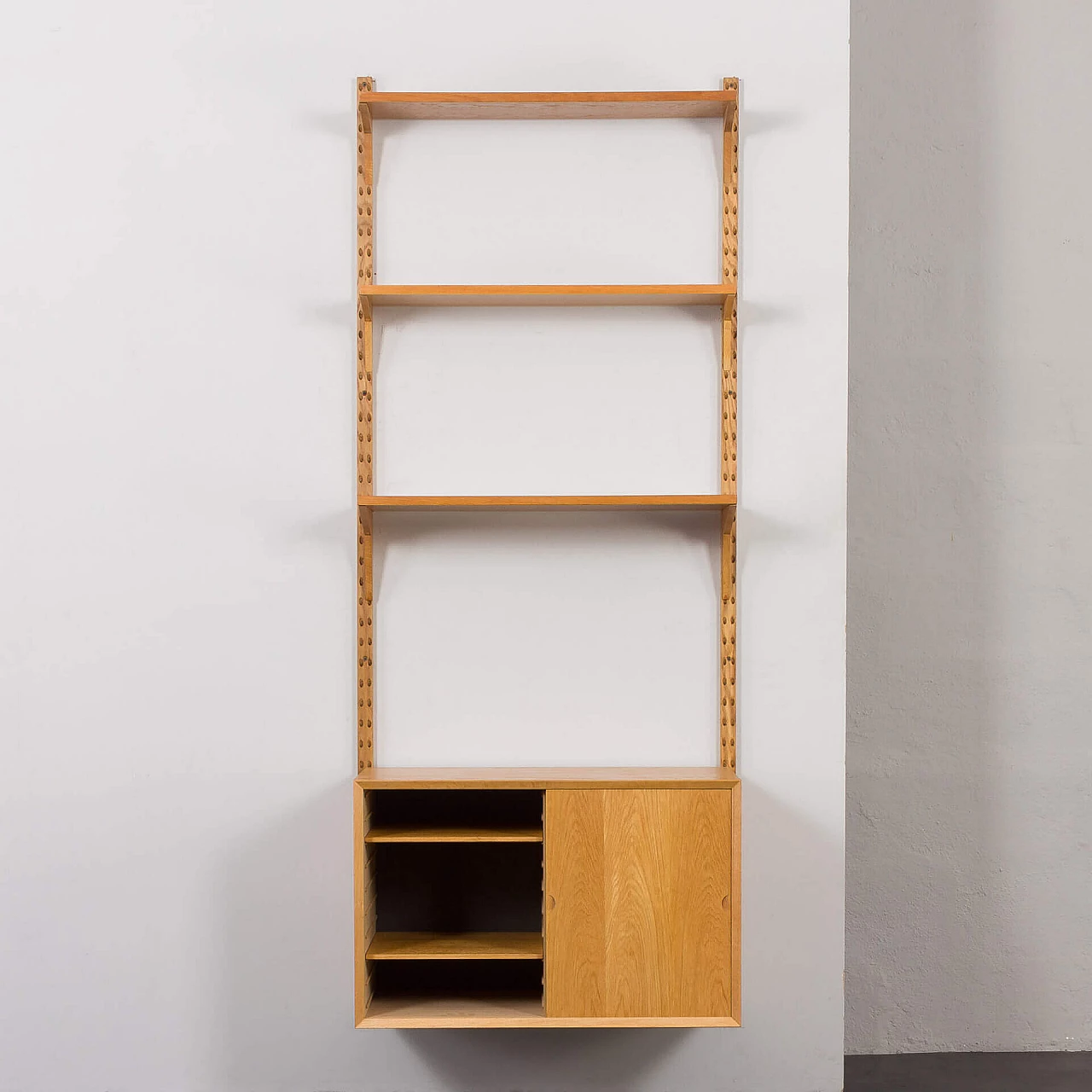 One-bay oak bookcase with sliding door cabinet by Poul Cadovius, 1960s 6