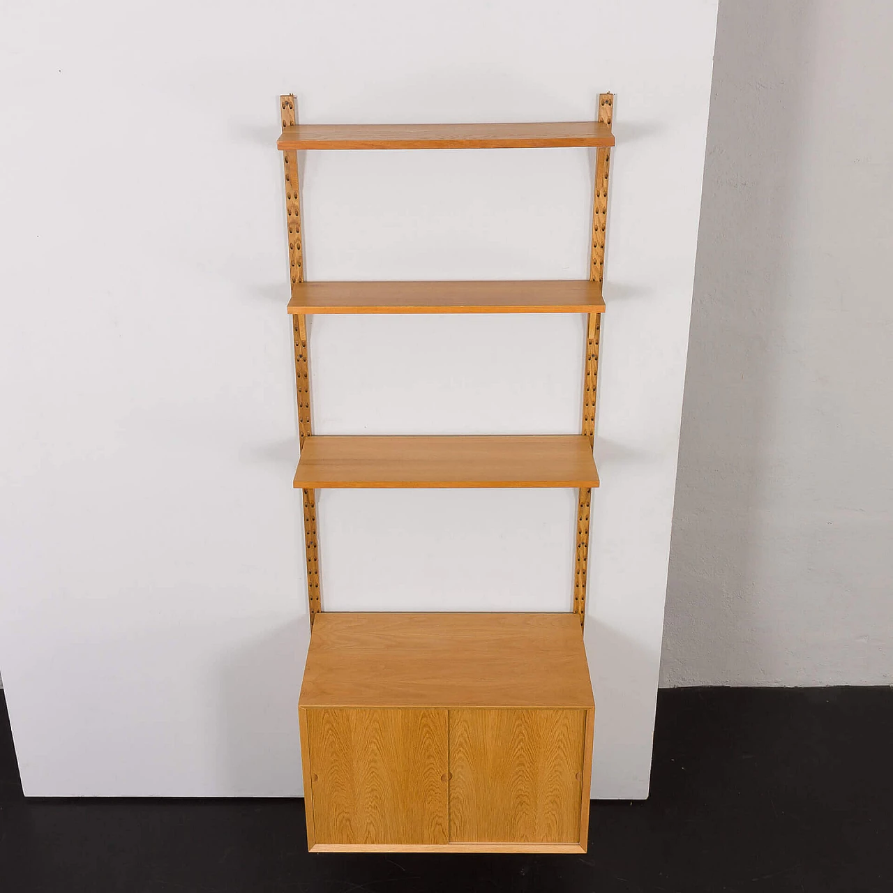 One-bay oak bookcase with sliding door cabinet by Poul Cadovius, 1960s 8