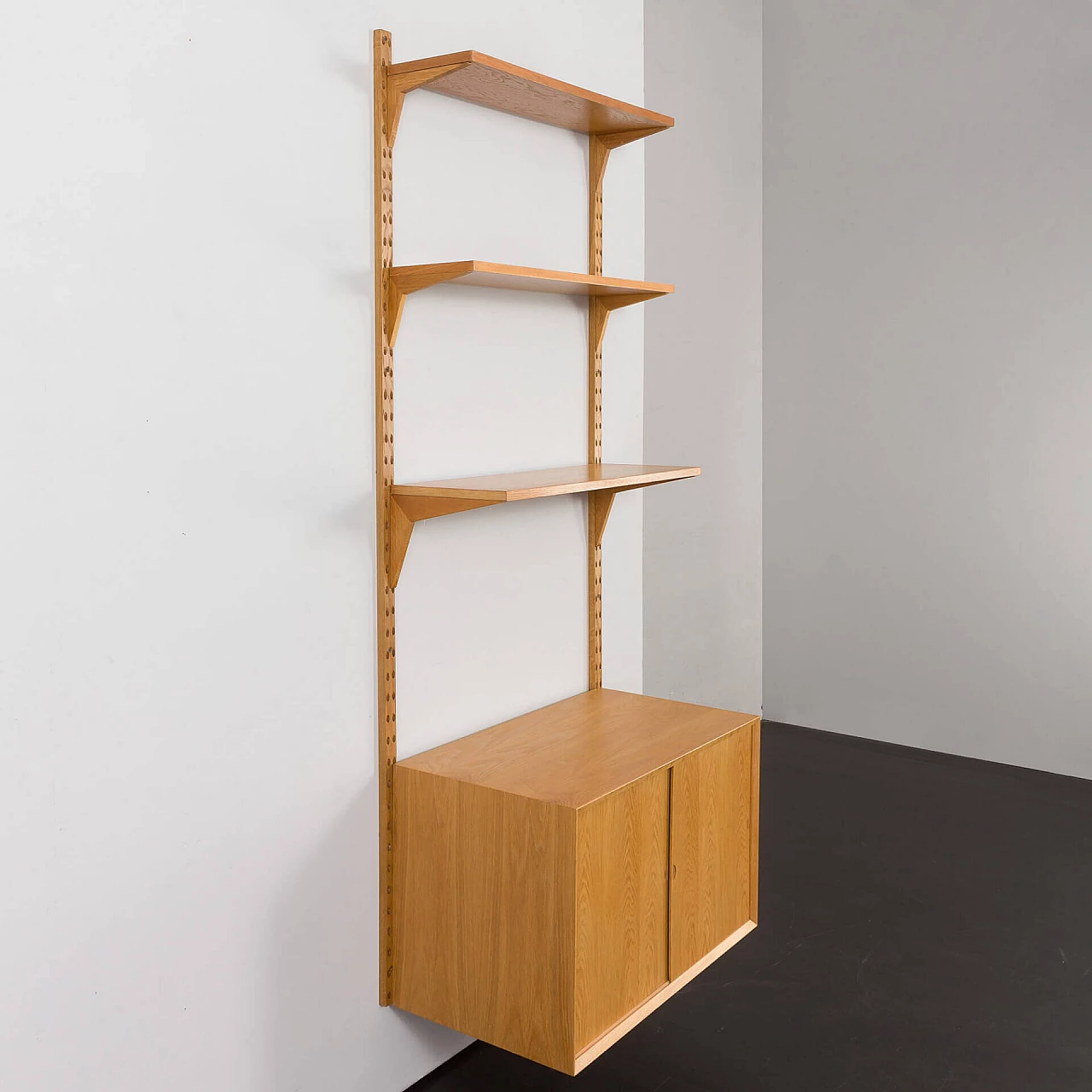 One-bay oak bookcase with sliding door cabinet by Poul Cadovius, 1960s 9