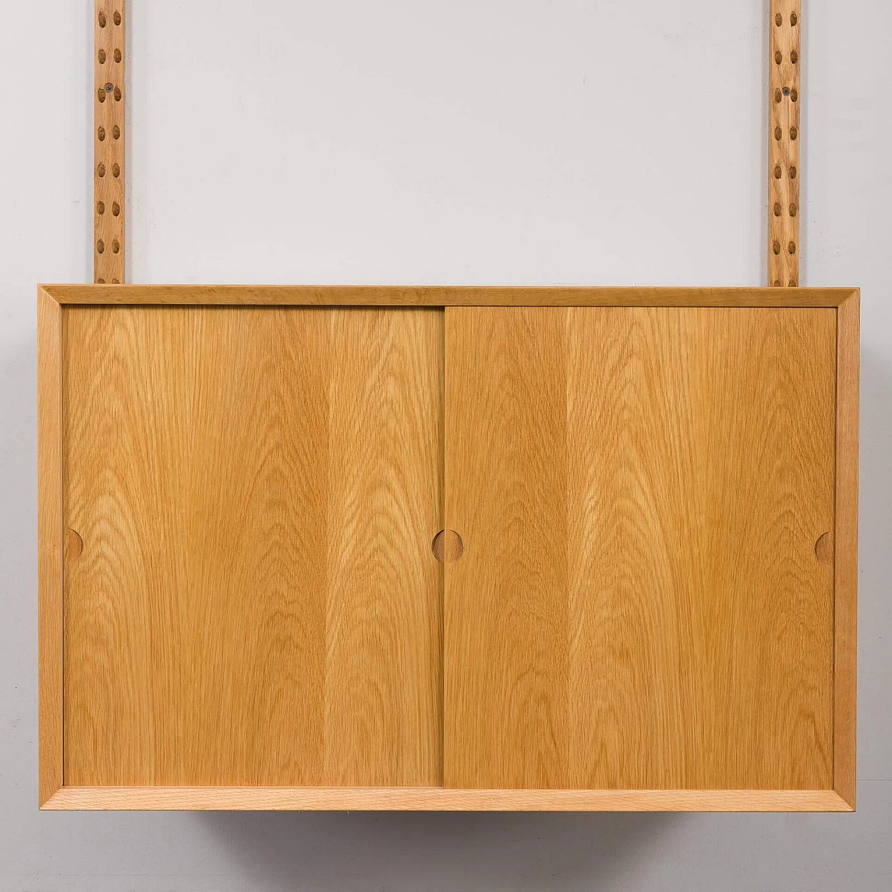 One-bay oak bookcase with sliding door cabinet by Poul Cadovius, 1960s 10