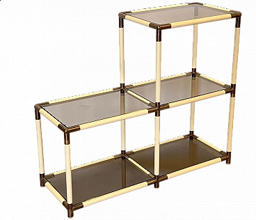 Ivory shelf unit in pvc with brass details and smoked glass shelves by Banci, 1970s