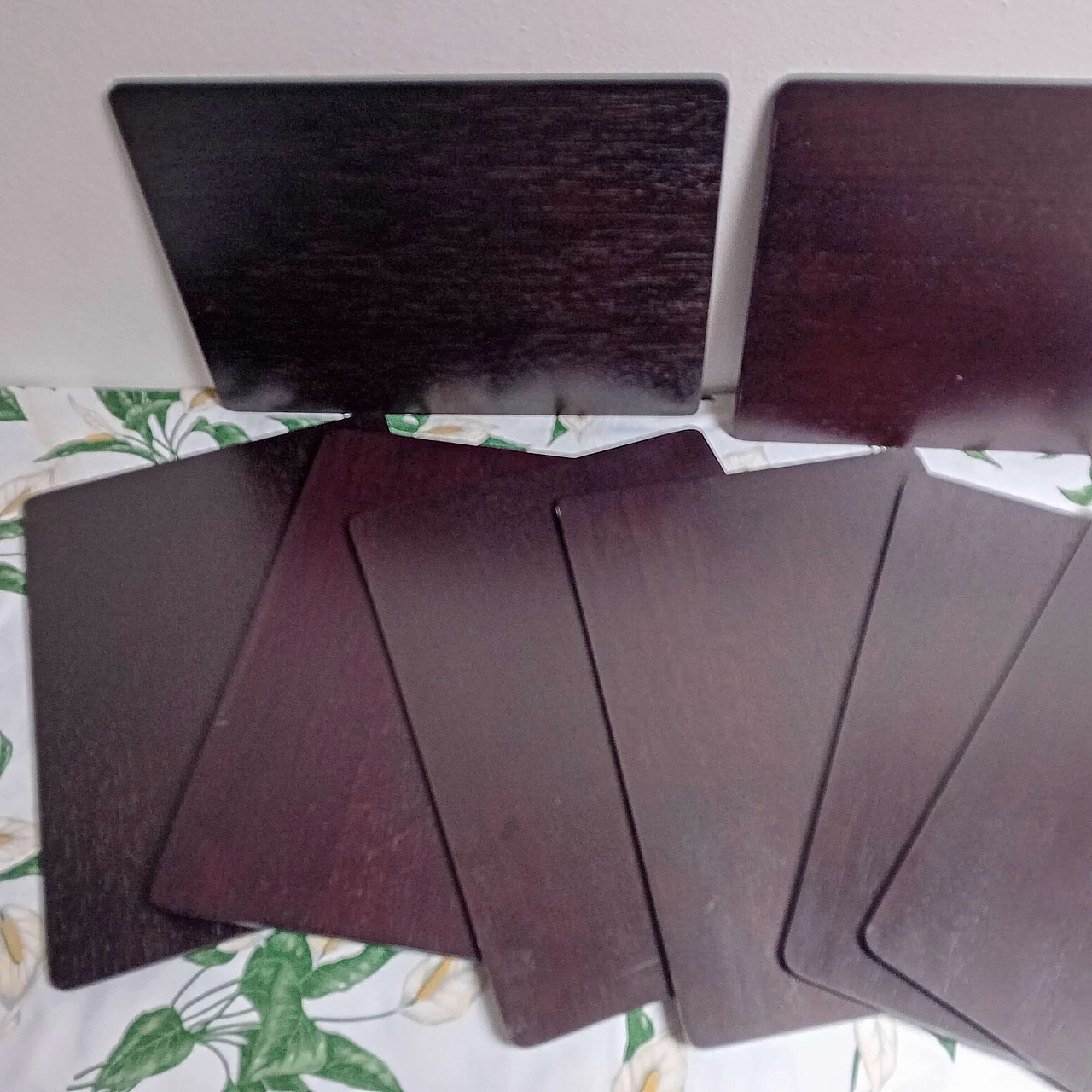 8 Teak place mats, 1990s 9