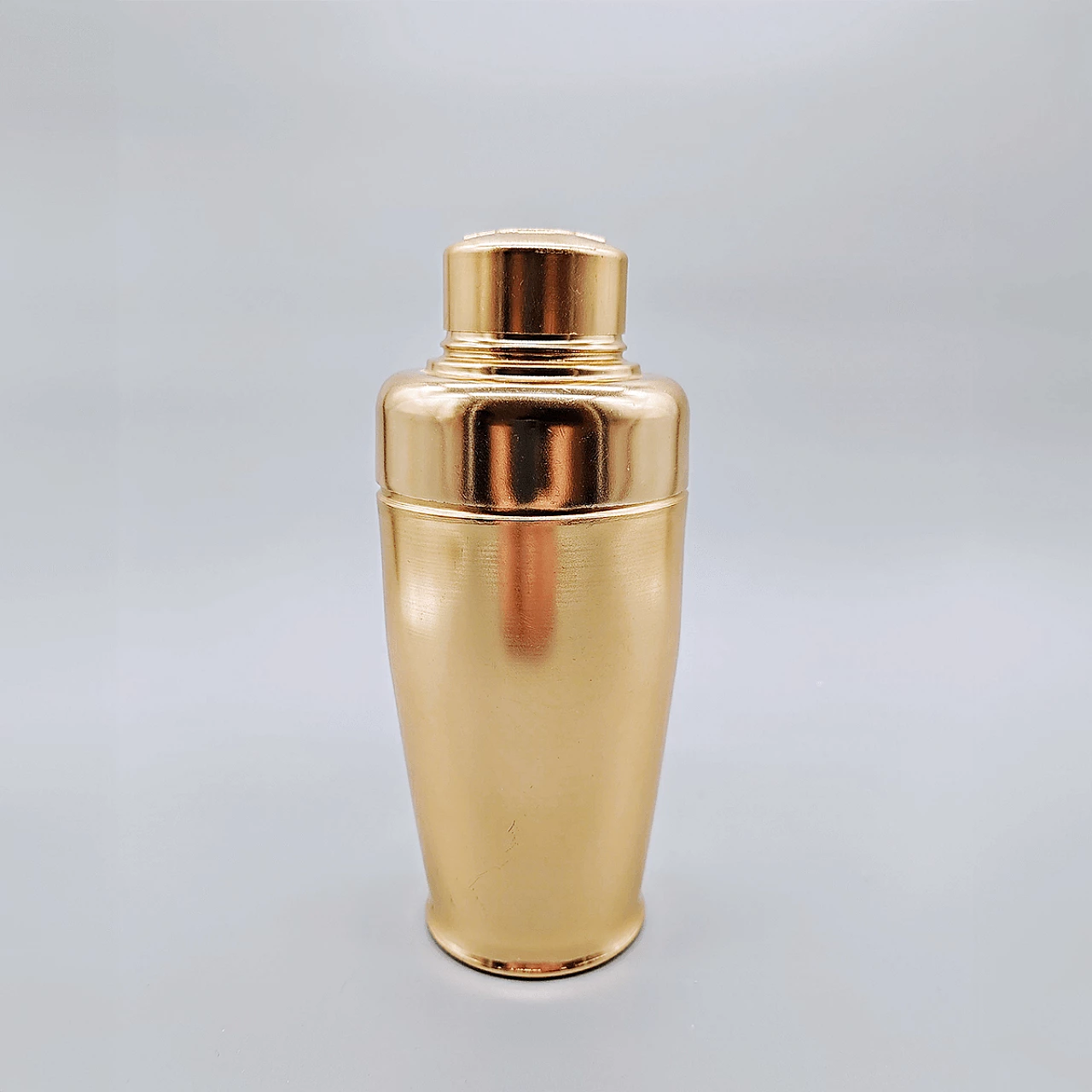 Martini cocktail shaker in gold colour, 1960s 1