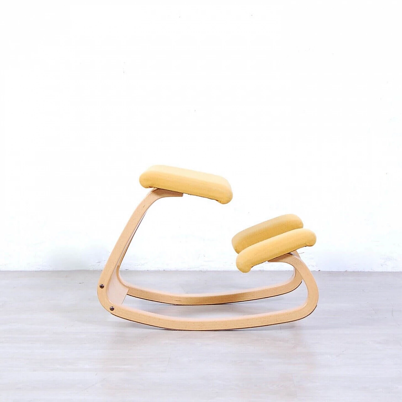 Yellow Stokke ergonomic chair by Peter Opsvik, 1980s 1