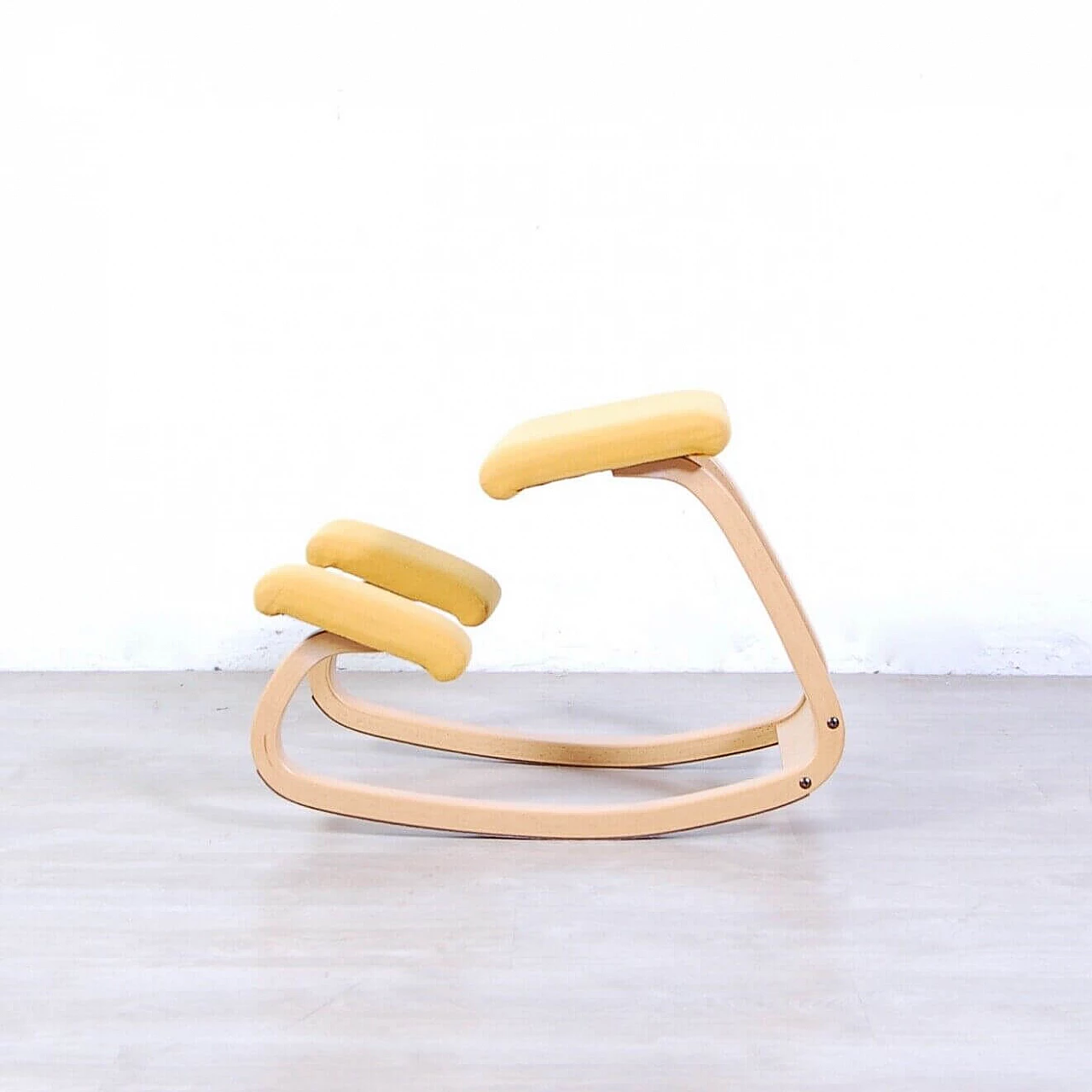 Yellow Stokke ergonomic chair by Peter Opsvik, 1980s 3