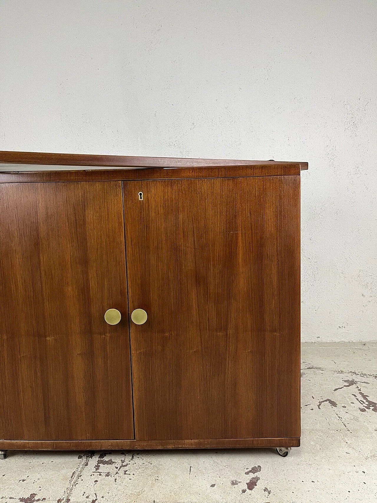 Wood, glass and brass bar cabinet with casters, 1970s 9