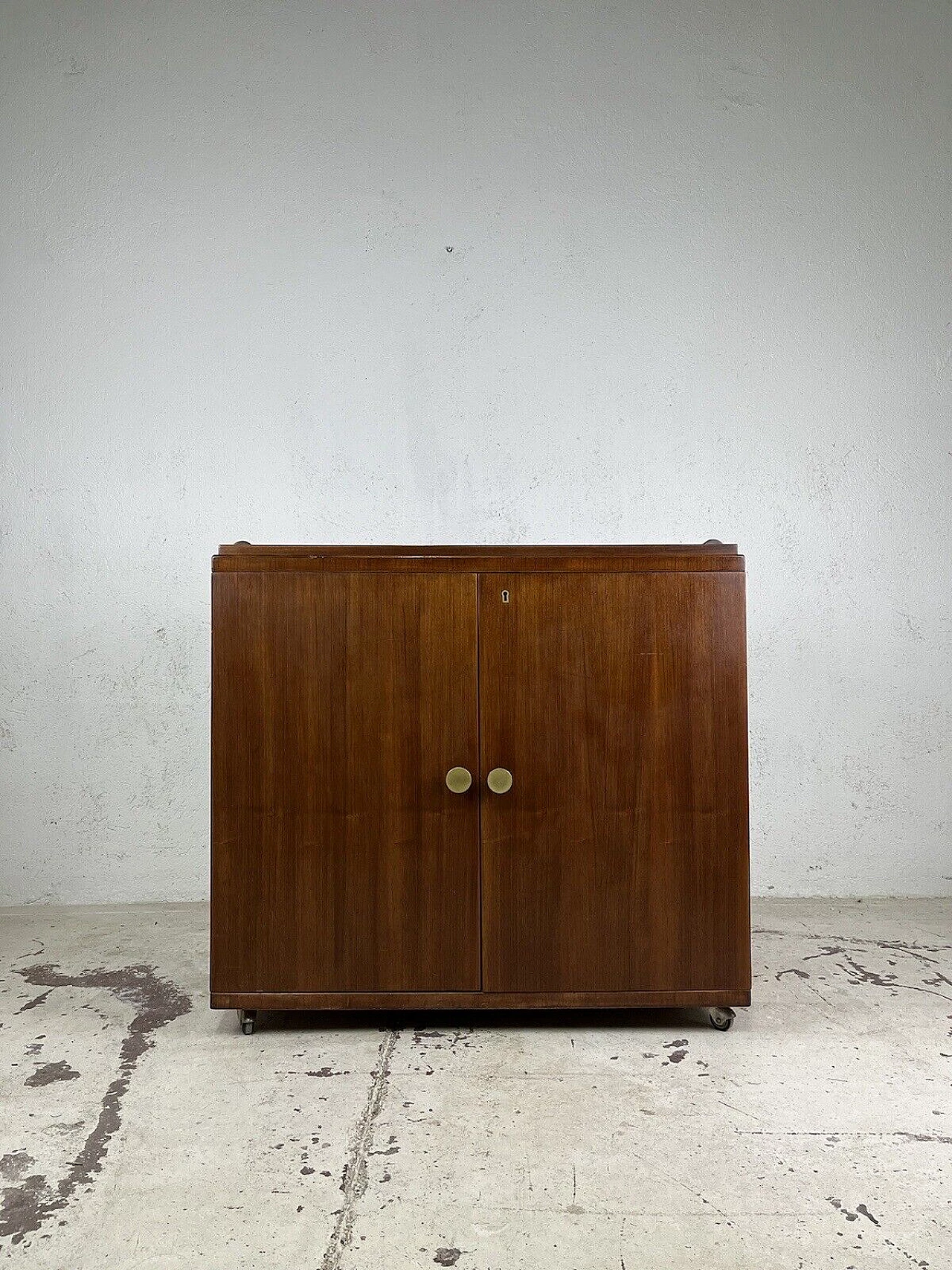 Wood, glass and brass bar cabinet with casters, 1970s 15