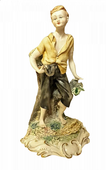 Volta, boy with sickle, Capodimonte ceramic sculpture