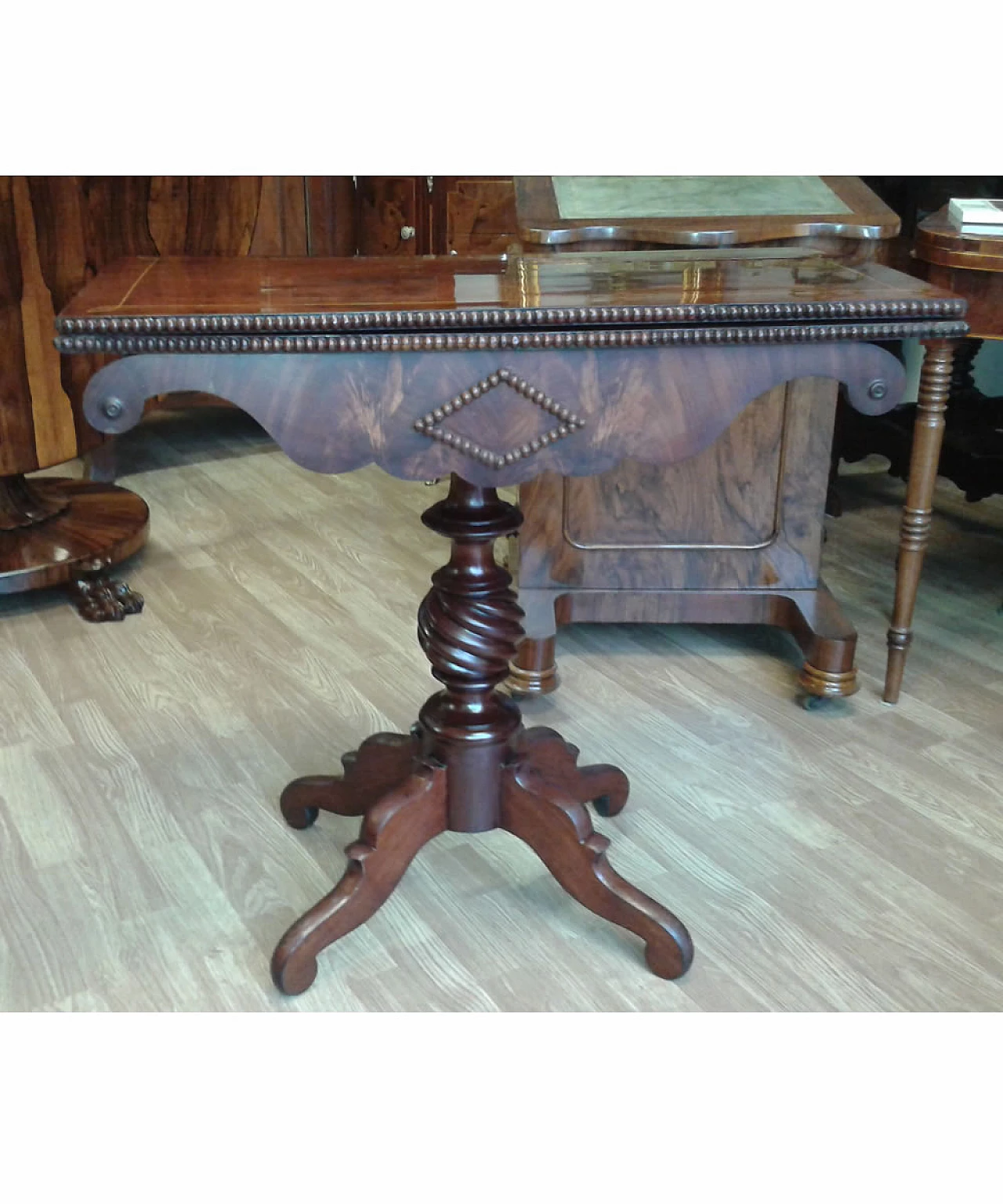 Mahogany game table with maple thread, 19th century 1