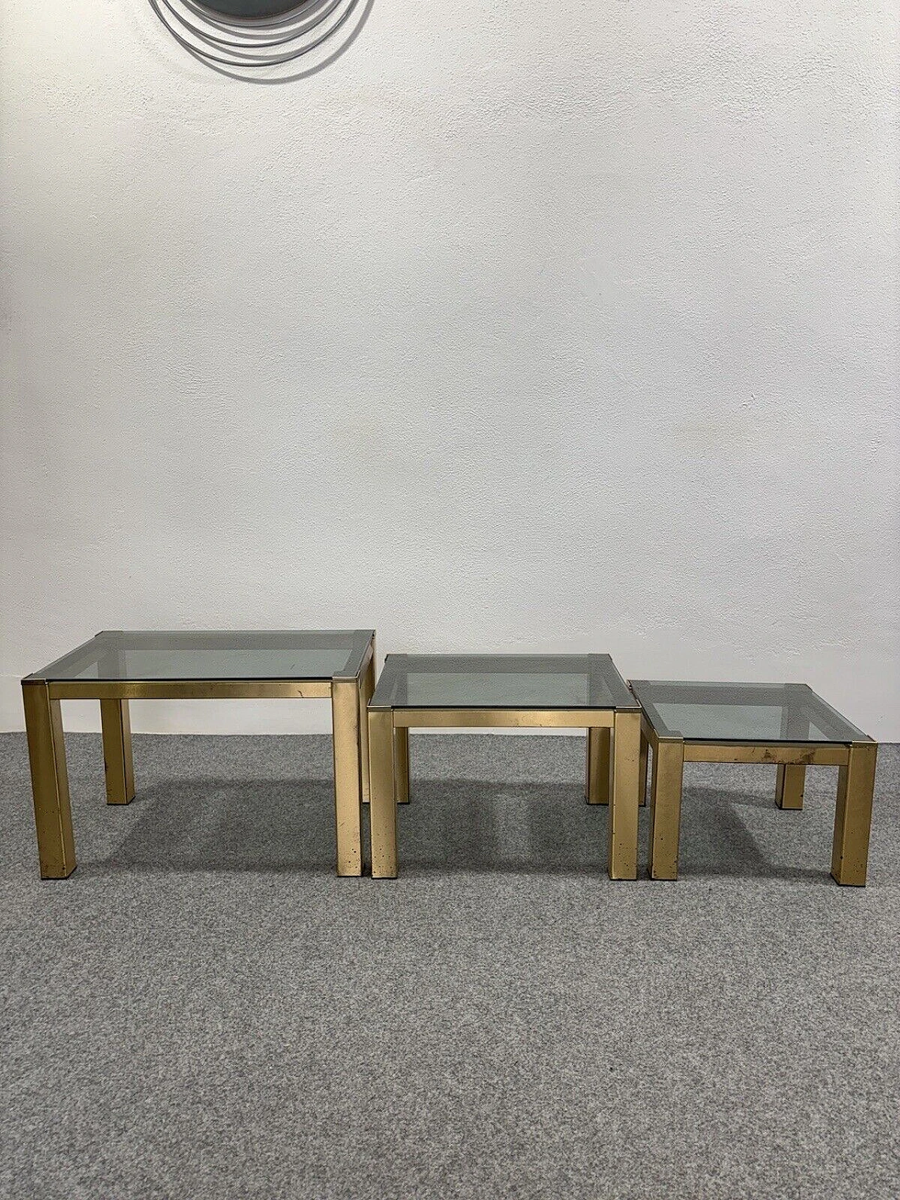 3 Nesting tables in brass and smoked crystal, 1970s 3