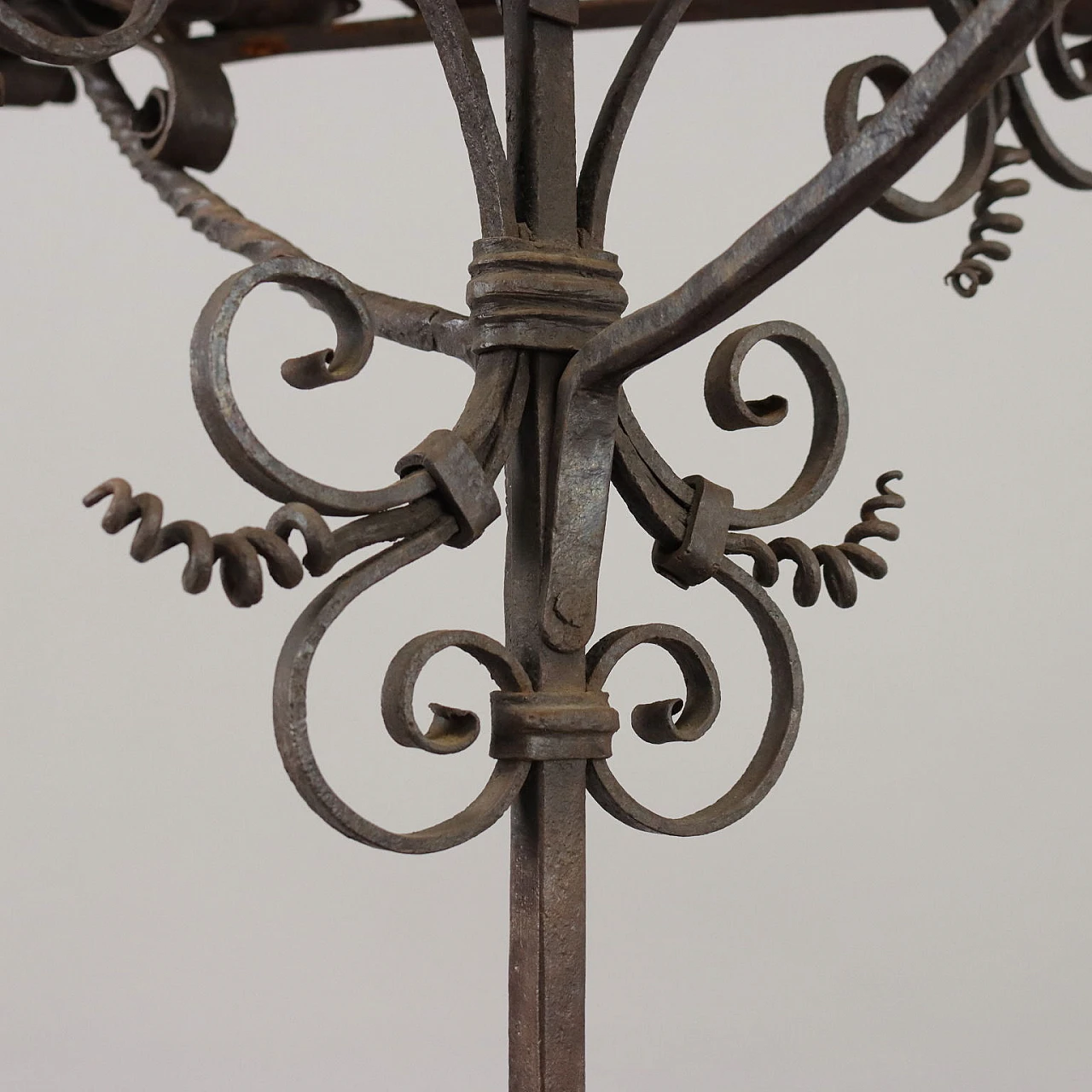 Wrought iron torcher worked with curl motif, 19th century 7