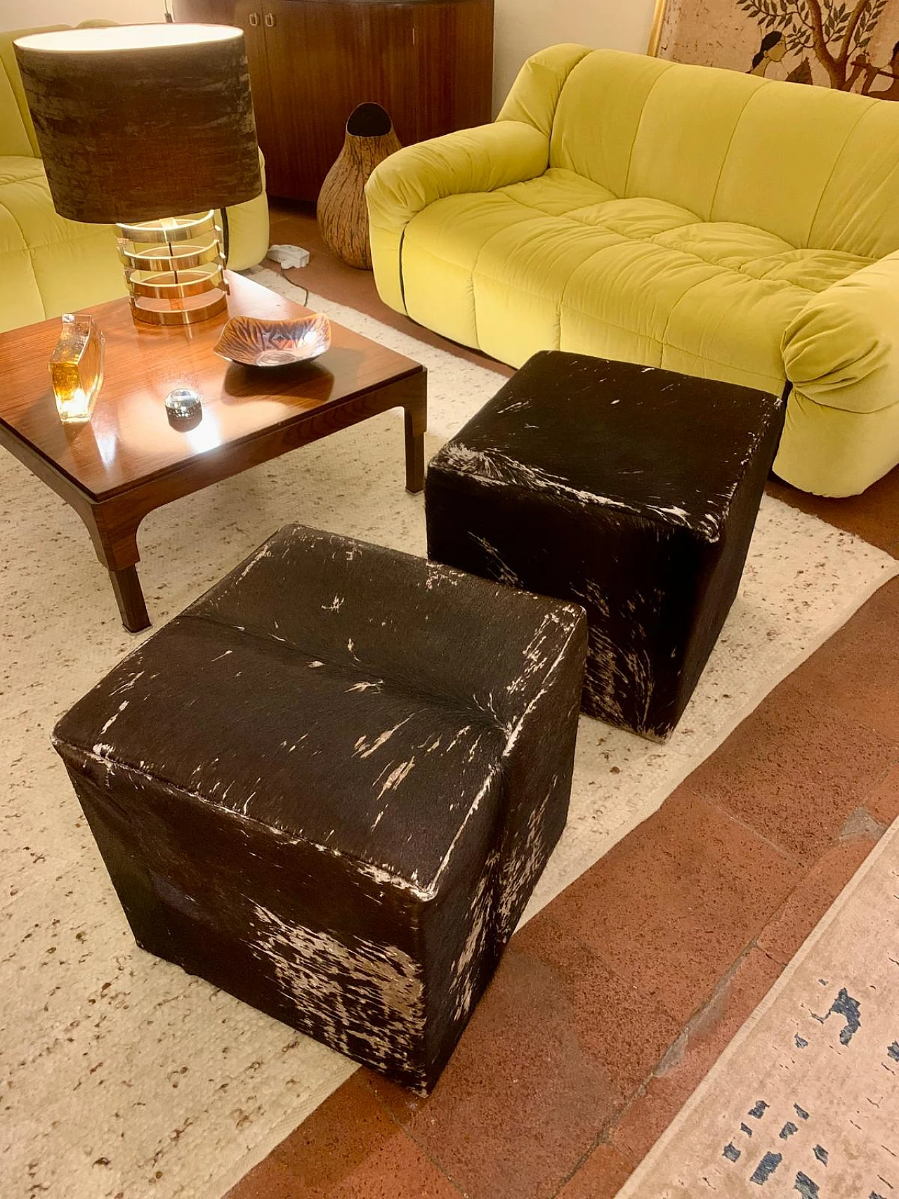 Pair of cowhide poufs, 1960s 1