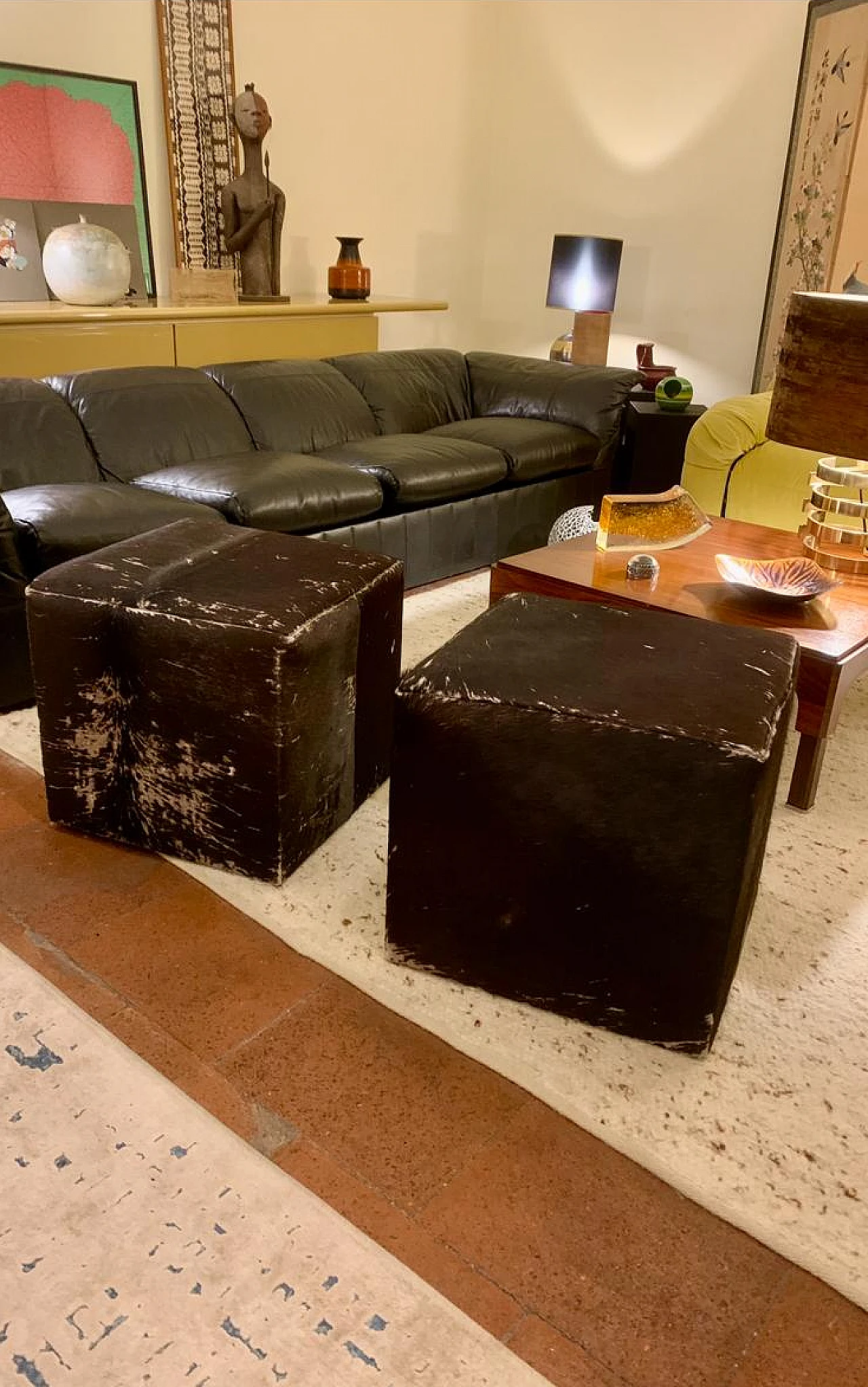 Pair of cowhide poufs, 1960s 3