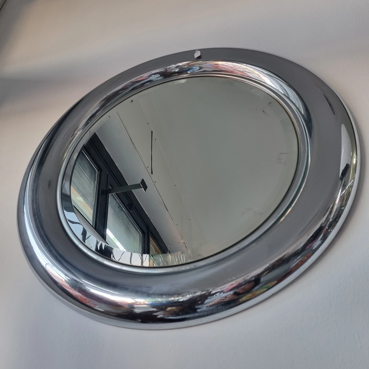 Polished chrome and smoked round mirror by Goffredo Reggiani, 1960s 1