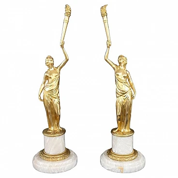 Pair of gilded bronzes on alabaster base, 1930s