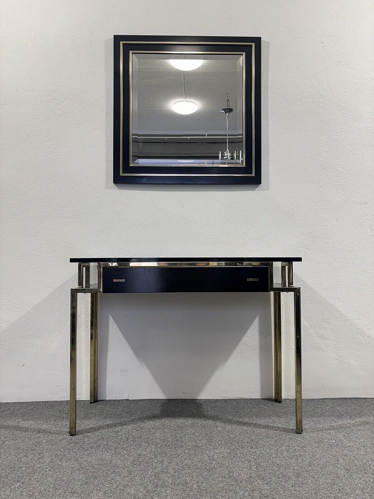 Gilded metal and black lacquered wood console and mirror, 1970s 1