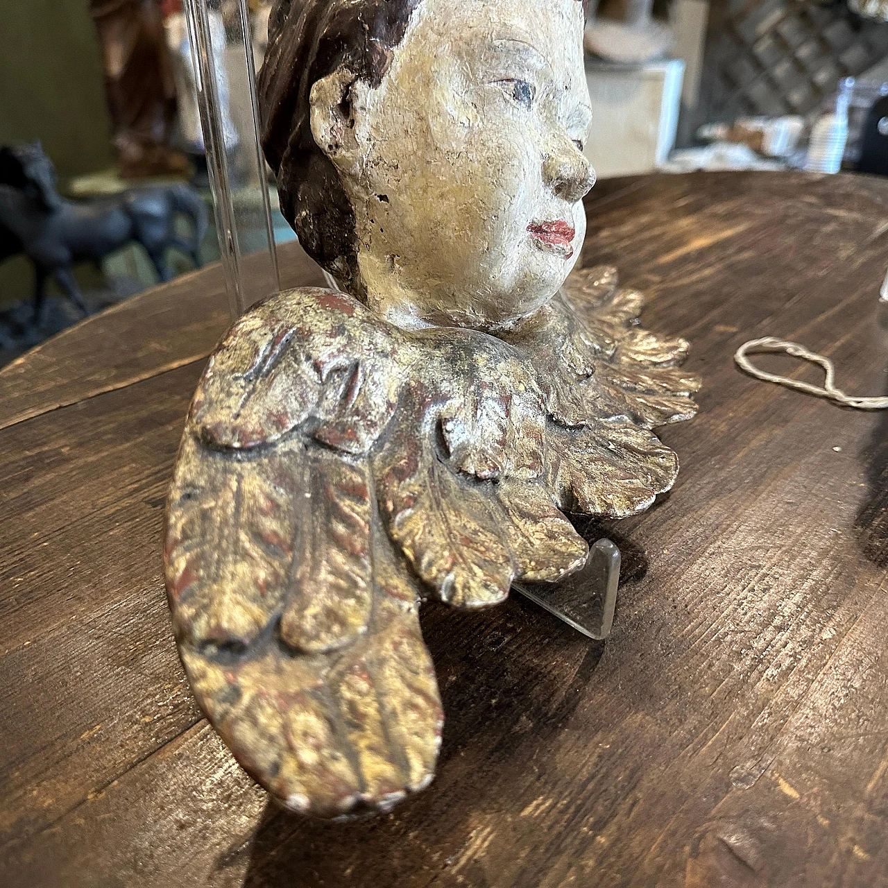 Pair of lacquered and carved wood winged angel heads, 1750s 10