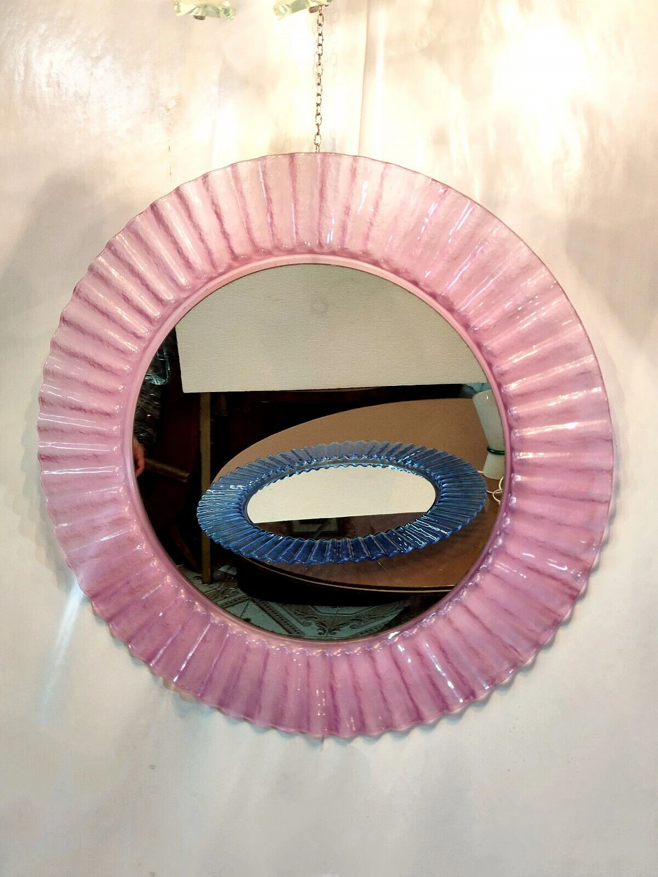 Pair of round pink and pale blue plastic mirrors, 1970s 1