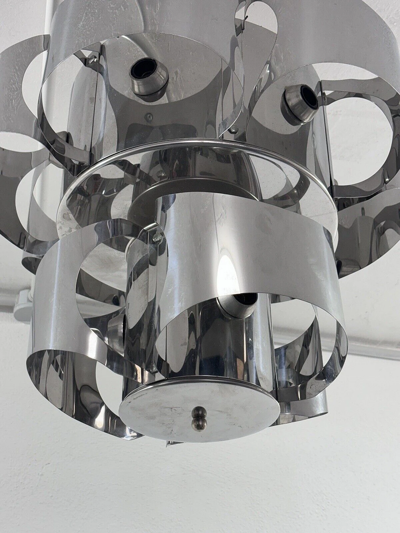 Curved chromed steel chandelier in the style of Max Sauze 5