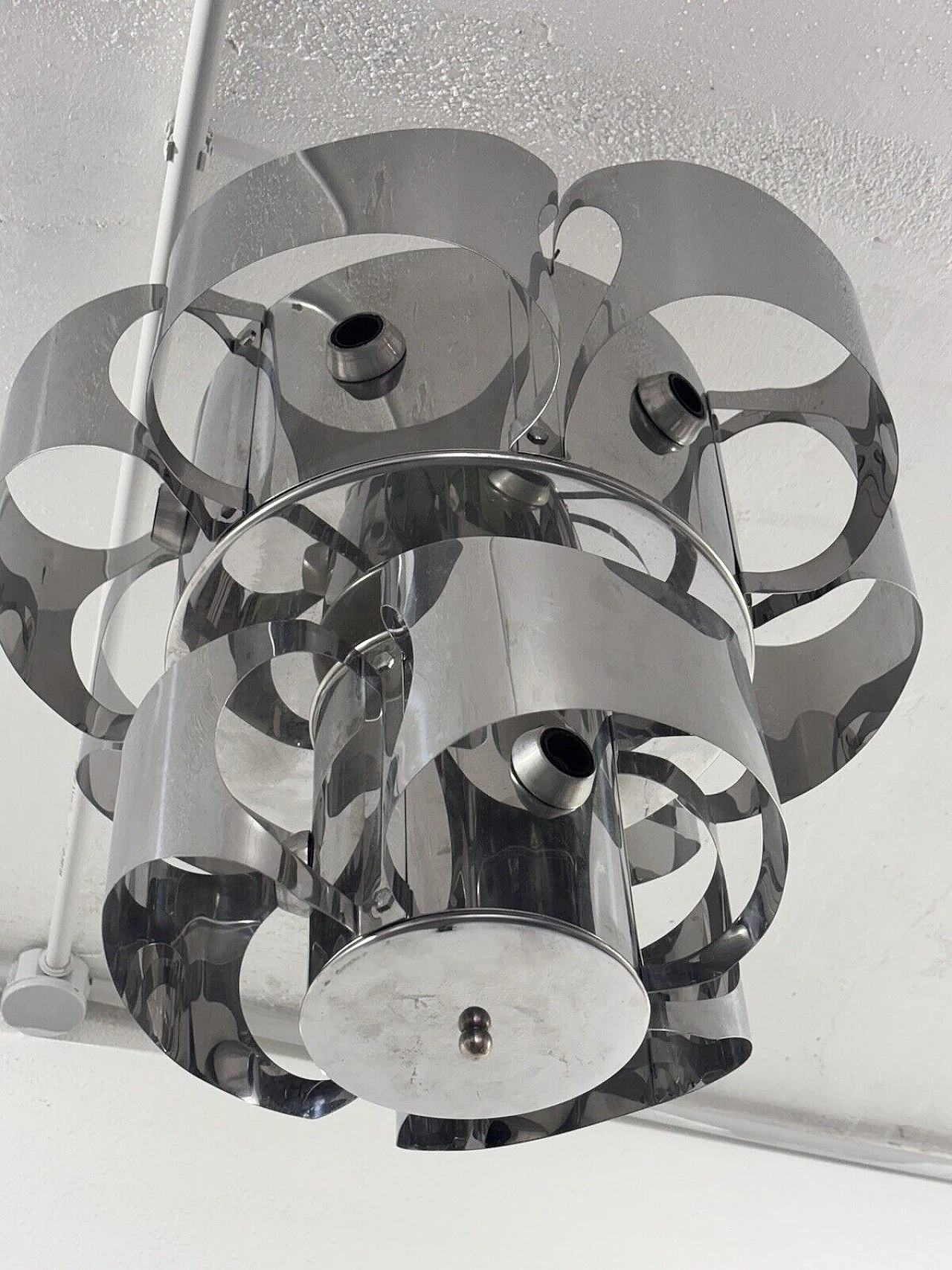 Curved chromed steel chandelier in the style of Max Sauze 6