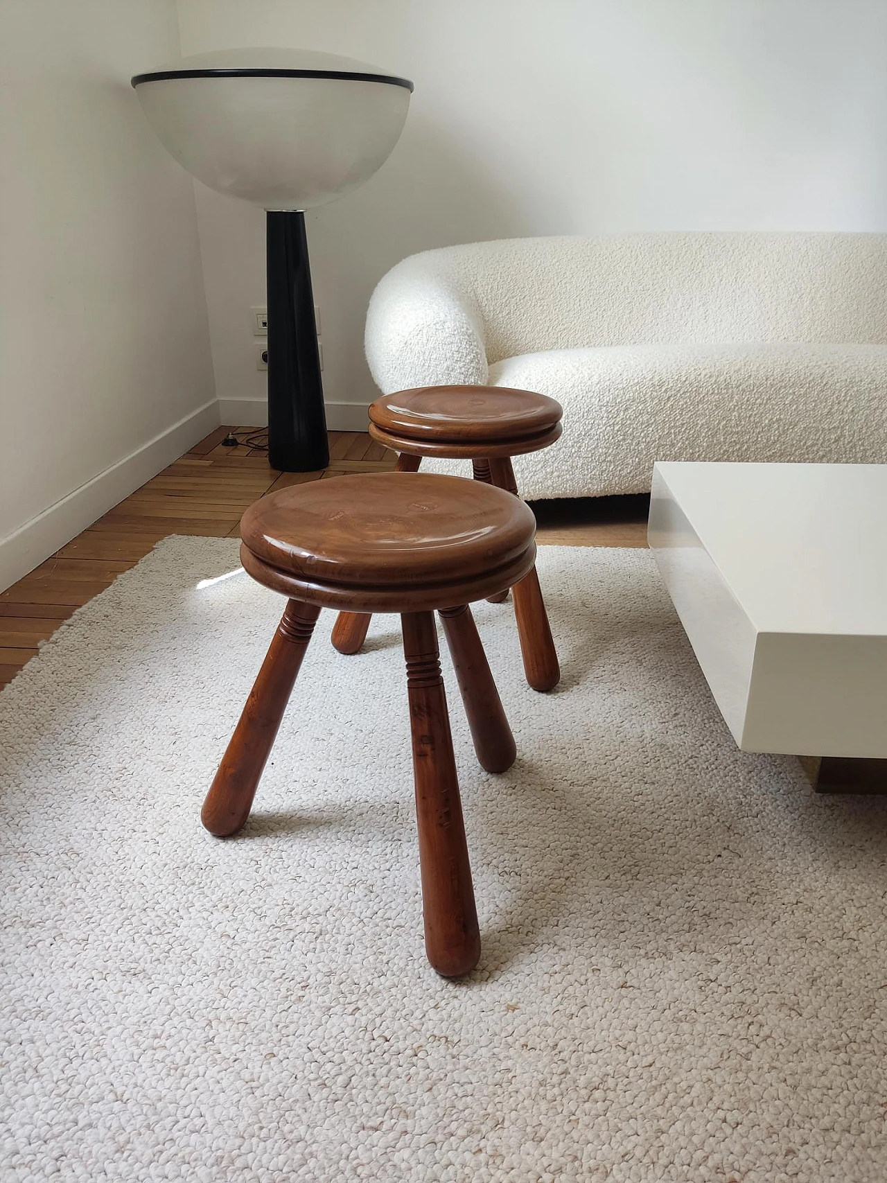 Pair of wooden tripod stools in the style of Charlotte Perriand, 1970s 1