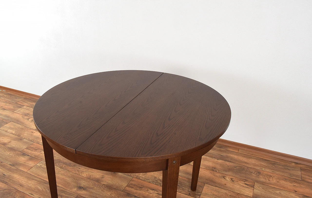 Oak extendable table by Jarocińskie Fabryki Mebli, 1960s 9