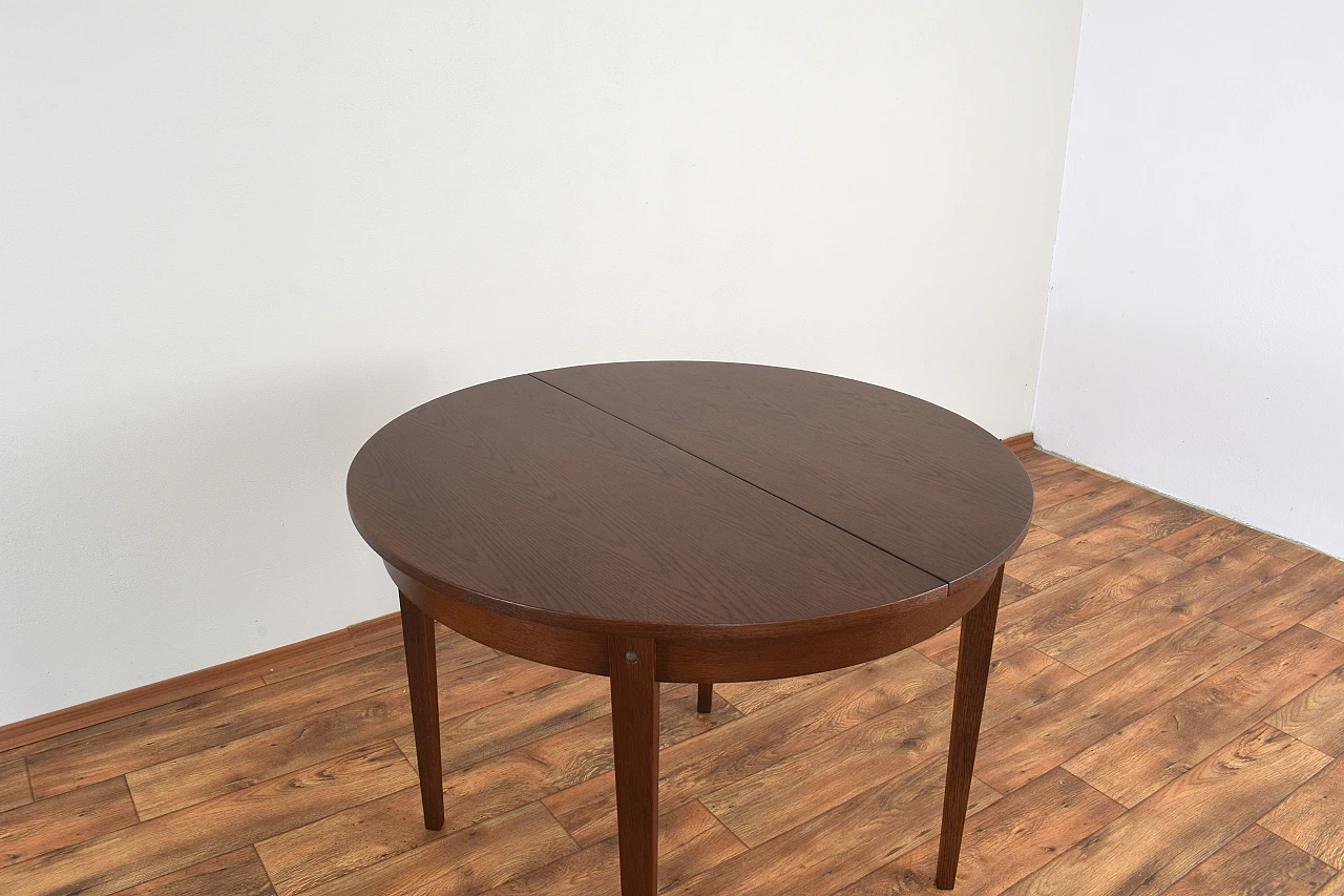 Oak extendable table by Jarocińskie Fabryki Mebli, 1960s 10