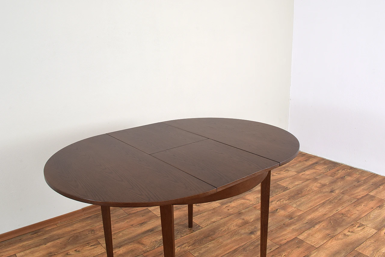 Oak extendable table by Jarocińskie Fabryki Mebli, 1960s 11